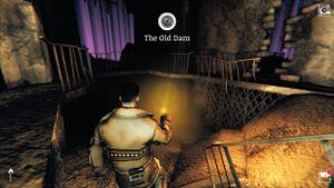 In-game screenshot of the inside of The Old Dam.